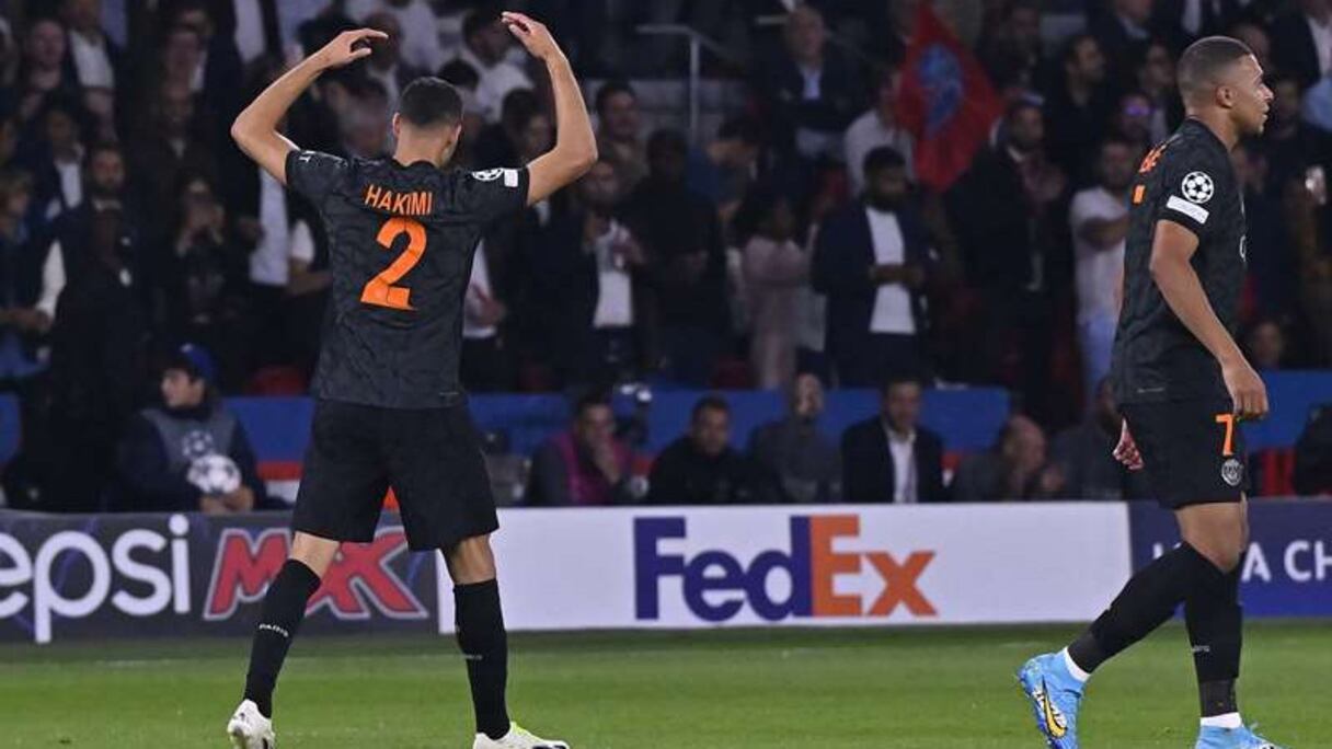 Achraf Hakimi, Kylian Mbappé et Vitinha lors du match PSG-Dortmund (2-0), le 19 septembre 2023.