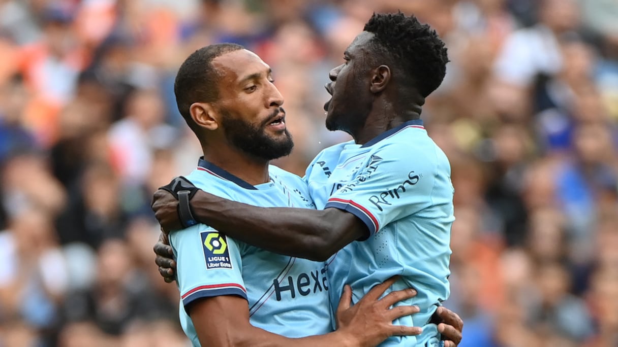 Yunis Abdelhamid avec son coéquipier Azor Matusiwa.