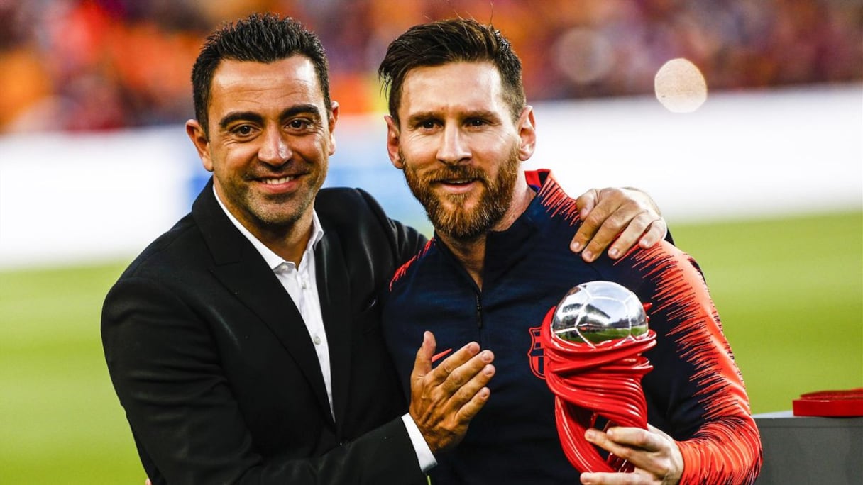 Xavi et Lionel Messi.