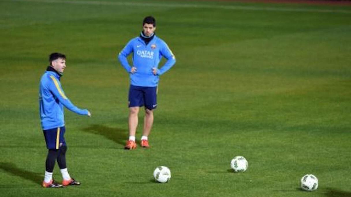 Luis Suarez et Lionel Messi.