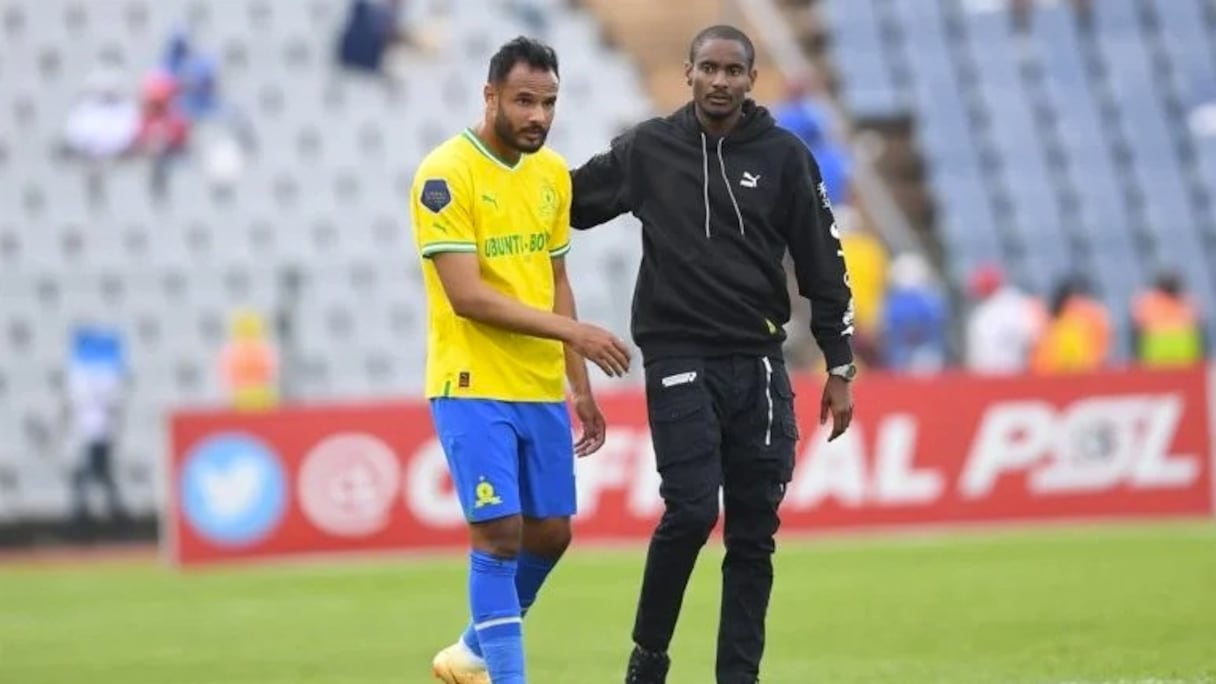 Abdelmounaim Boutouil en compagnie de Rulani Mokwena