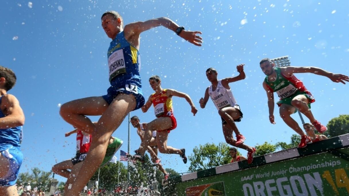 Des concurrents lors des Mondiaux juniors à Eugene dans l'Oregon, le 25 juillet 2014.