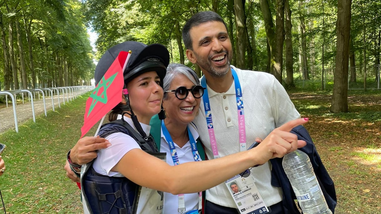 Nawal El Moutawakel, Hicham El Guerrouj et Noor Slaoui au parc du château de Versailles, le 29 juillet 2024.