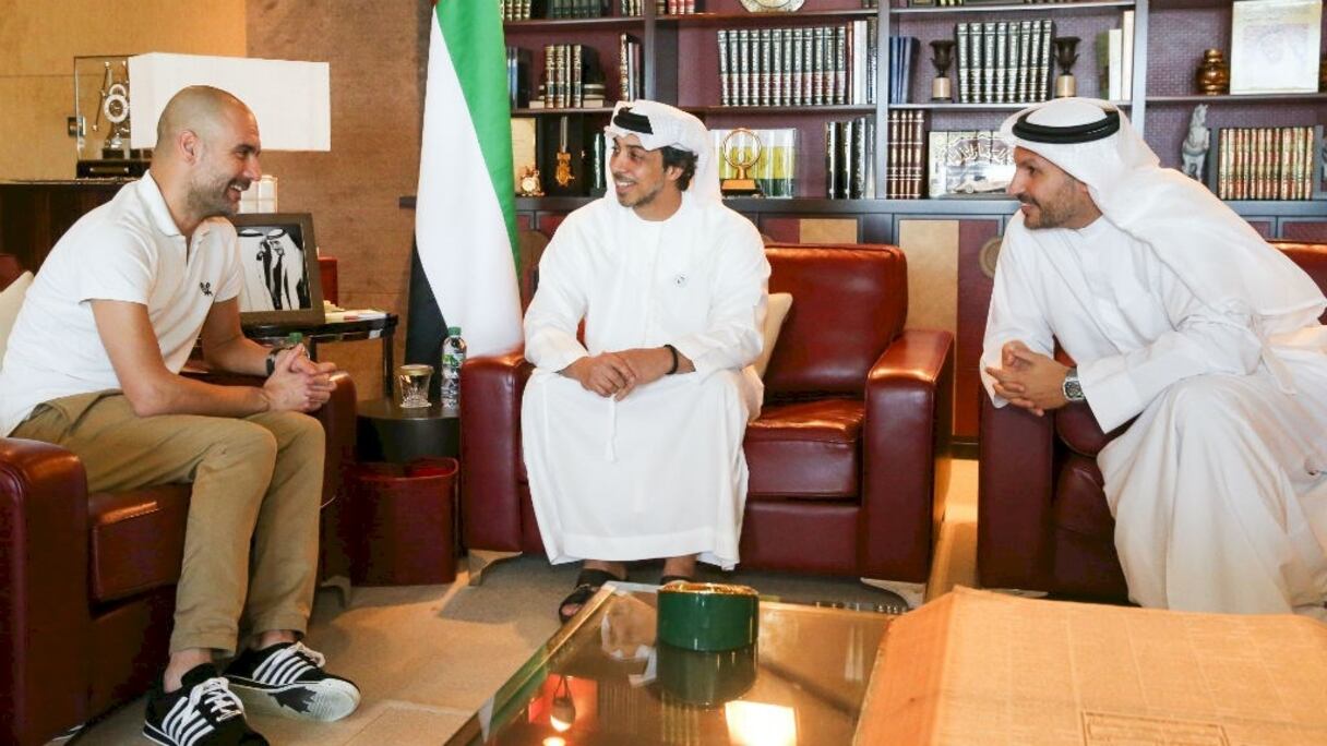 Les joueurs de Manchester City célébrant une victoire.