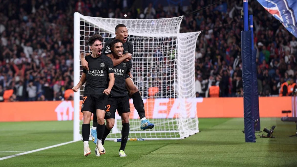 Achraf Hakimi, Kylian Mbappé et Vitinha lors du match PSG-Dortmund (2-0), le 19 septembre 2023.