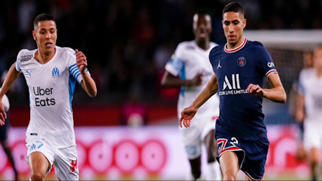 Achraf Hakimi et Amine Harit lors d'un match de Ligue 1 entre le PSG et l'OM.