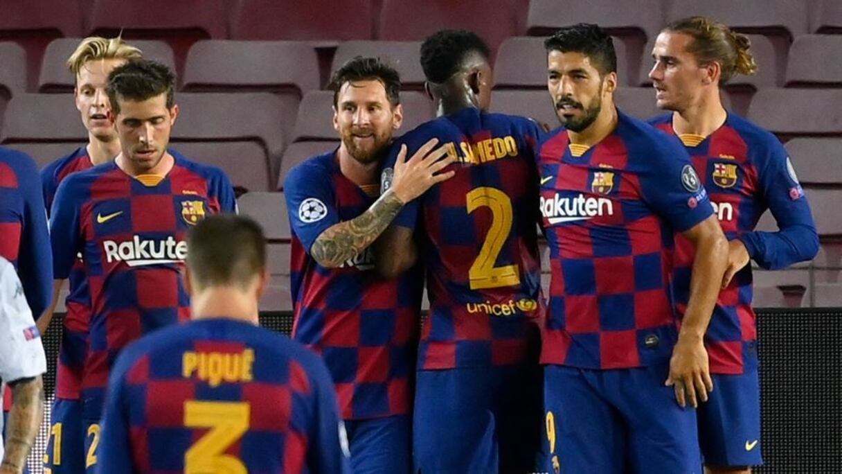 Lionel Messi et Ronald Koeman.